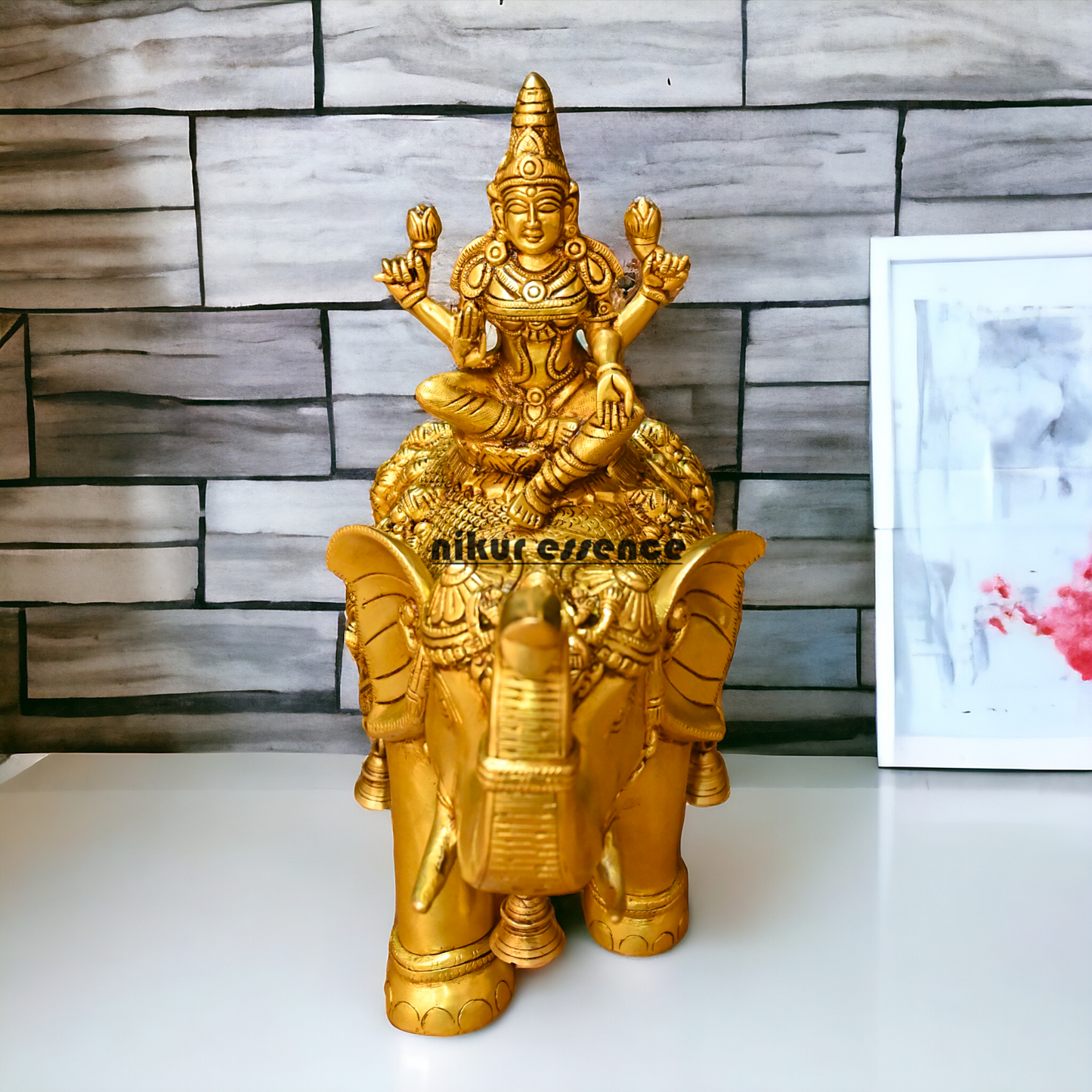 Buy Bass Statue of Lakshmi Seated Gracefully on an Elephant with Trunk Raised – Symbol of Prosperity, Abundance, and Divine Blessings Nikuressence
