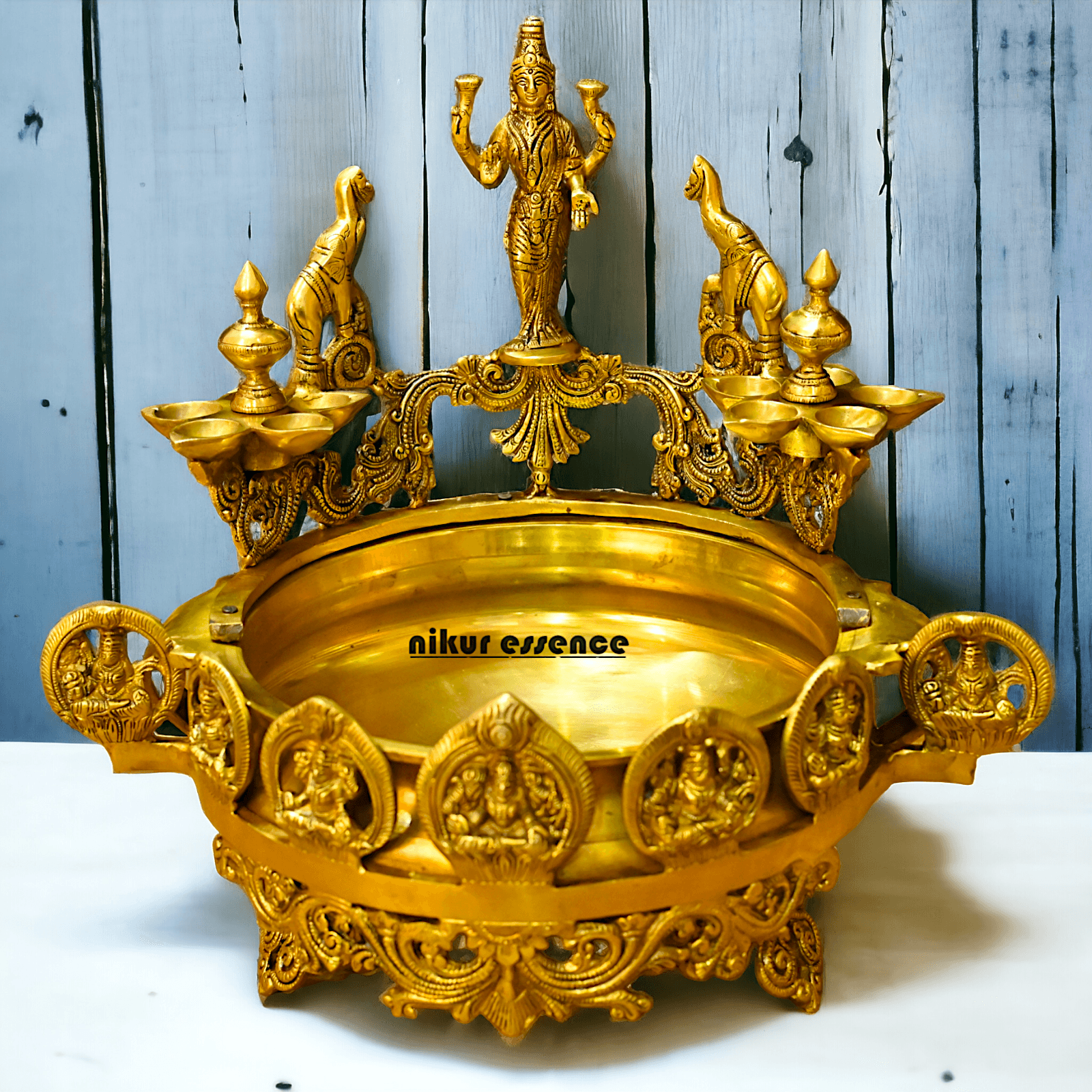 Buy Brass Ashtalakshmi Urli with Multi Wicks Lamp 40.5 cm Intricately Designed for Spiritual and Decorative Use – Nikur Essence Nikuressence