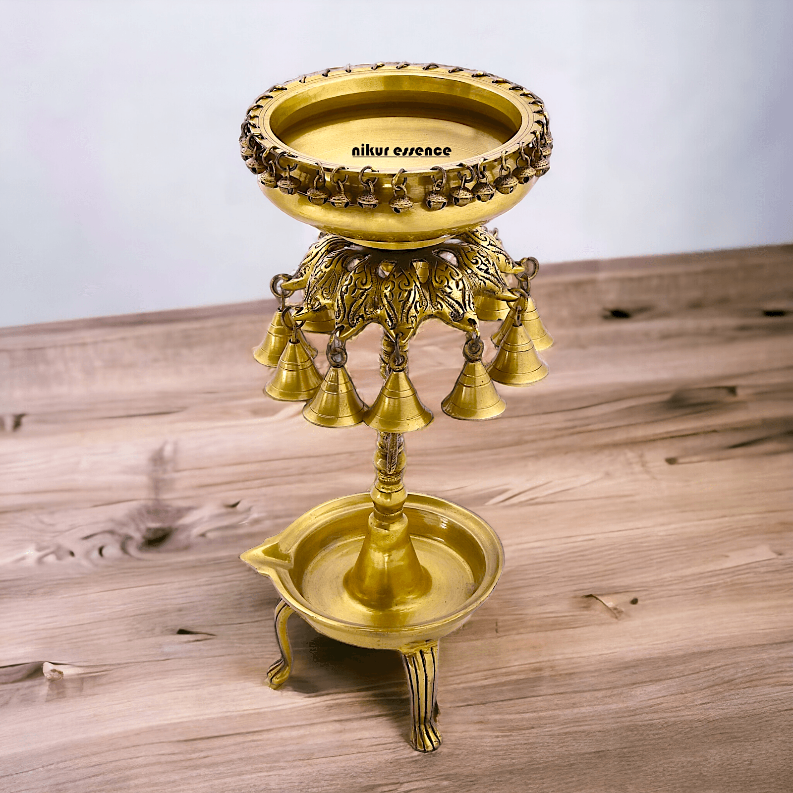 Buy Online Brass Bells Urli with Diya Stand – Elegant 50 cm Traditional Indian Decorative Piece for Home, Office, and Temple Altar Nikuressence