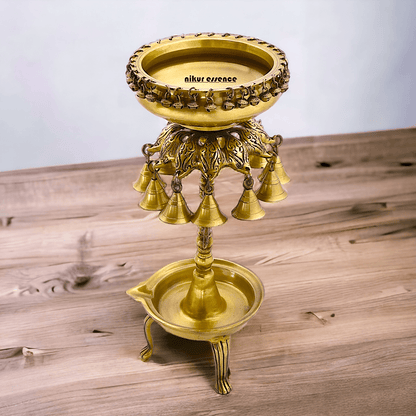 Buy Online Brass Bells Urli with Diya Stand – Elegant 50 cm Traditional Indian Decorative Piece for Home, Office, and Temple Altar Nikuressence