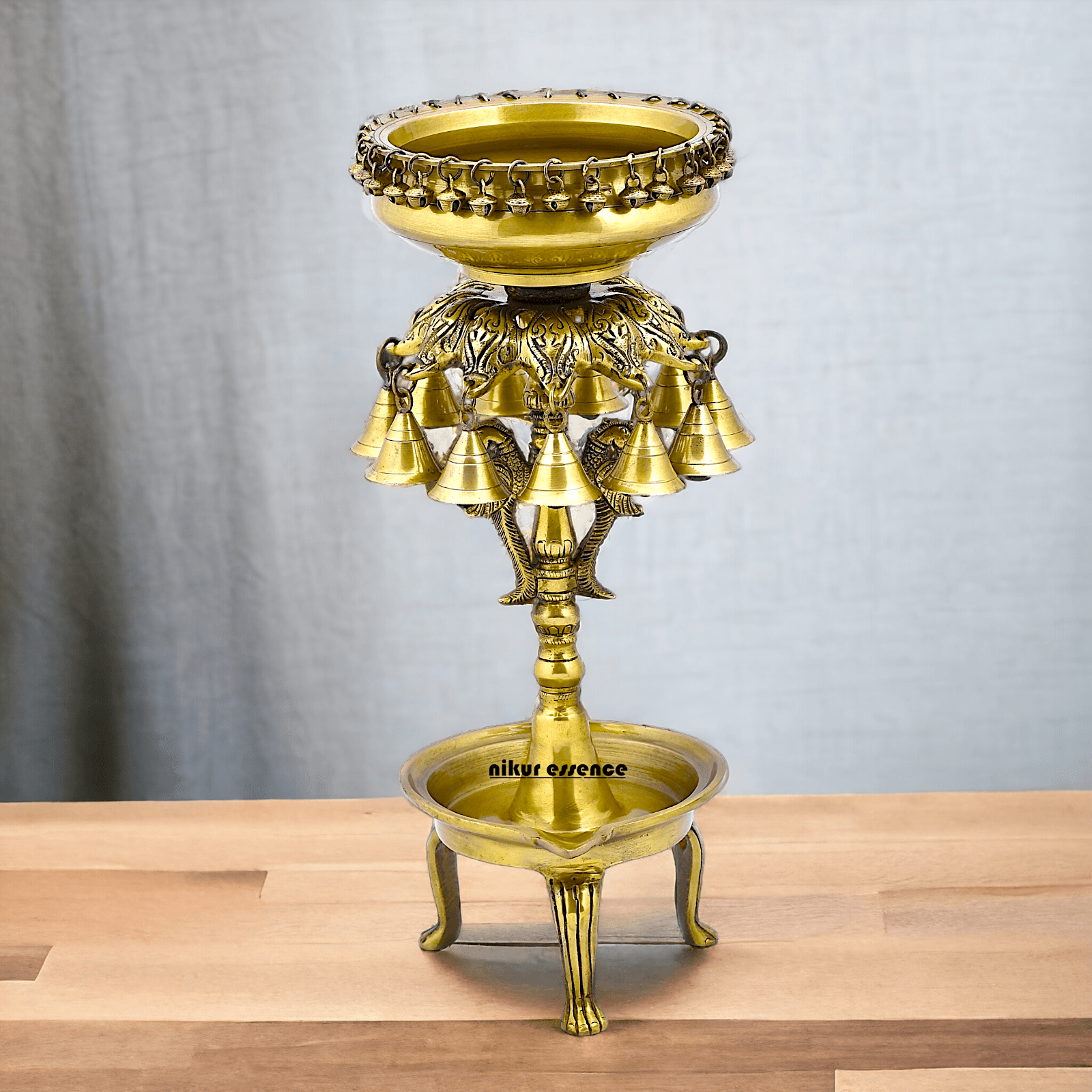 Buy Online Brass Bells Urli with Diya Stand – Elegant 50 cm Traditional Indian Decorative Piece for Home, Office, and Temple Altar Nikuressence