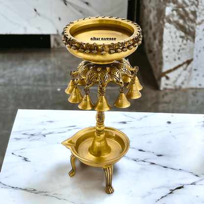 Buy Online Brass Bells Urli with Diya Stand – Elegant 50 cm Traditional Indian Decorative Piece for Home, Office, and Temple Altar Nikuressence