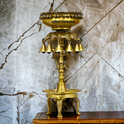 Buy Online Brass Bells Urli with Diya Stand – Elegant 50 cm Traditional Indian Decorative Piece for Home, Office, and Temple Altar Nikuressence