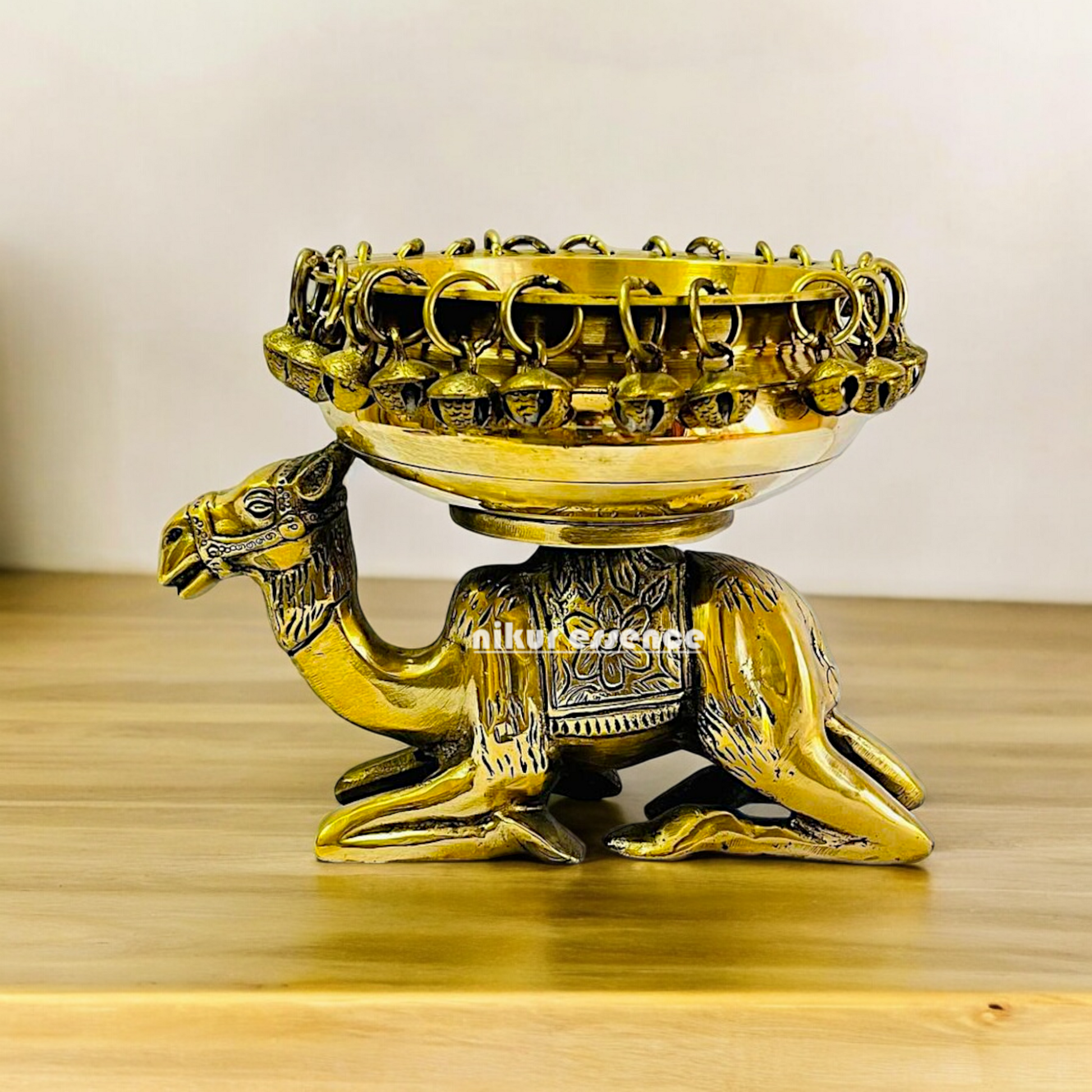 Buy online brass 20 cm Camel Design Traditional Indian Urli – Handcrafted Brass Decorative Bowl with Unique Camel Motif by Nikur Essence Nikuressence