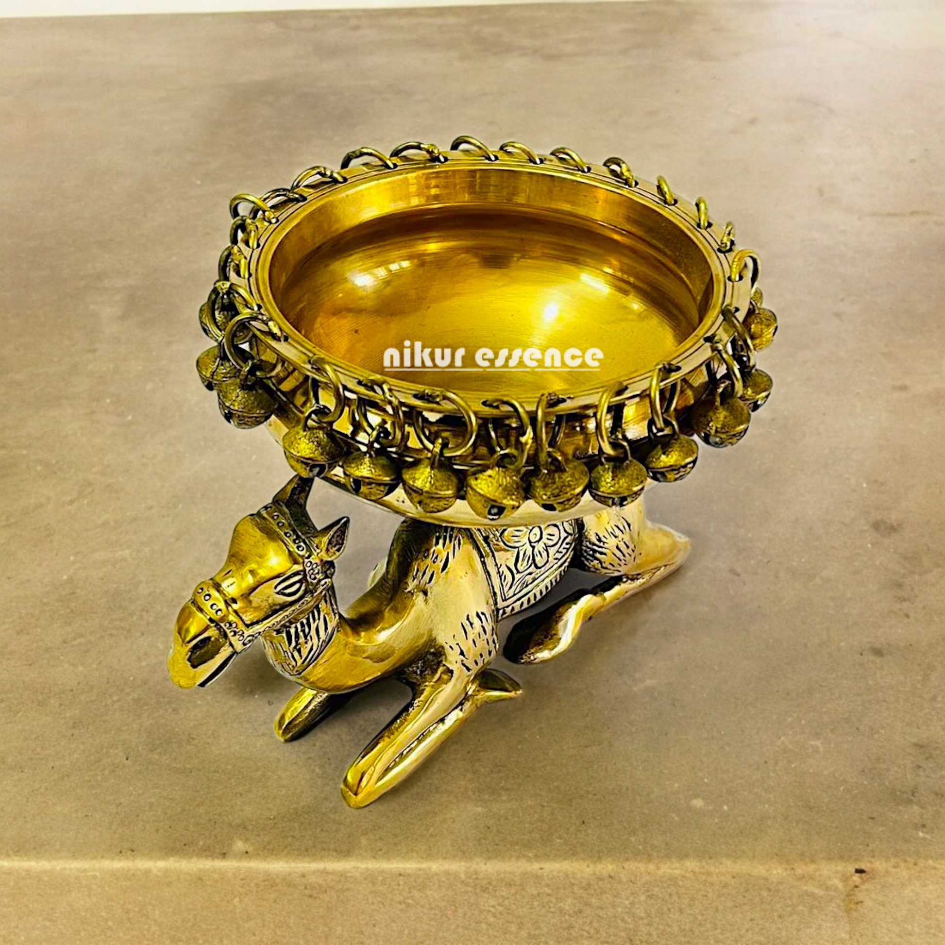 Buy online brass 20 cm Camel Design Traditional Indian Urli – Handcrafted Brass Decorative Bowl with Unique Camel Motif by Nikur Essence Nikuressence