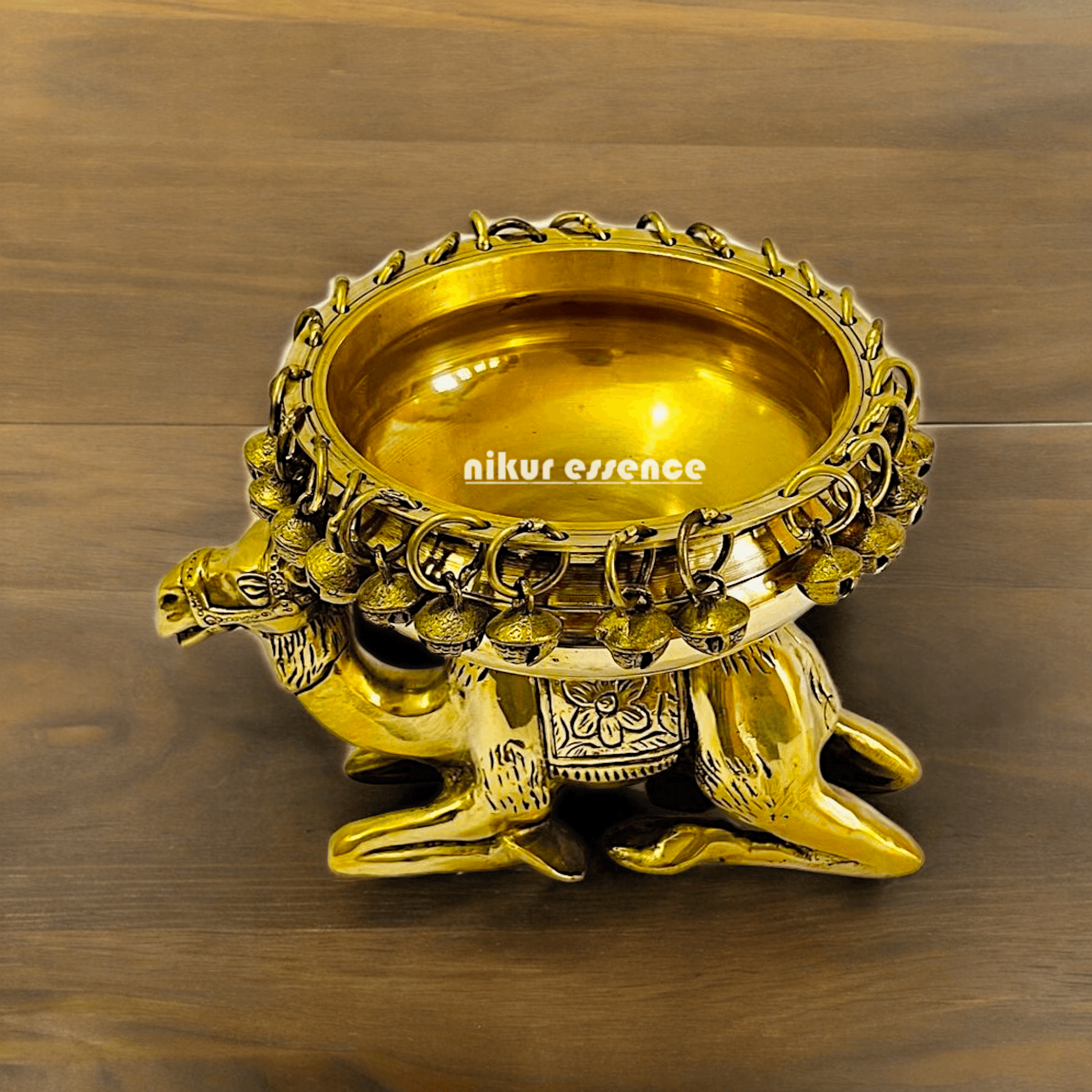 Buy online brass 20 cm Camel Design Traditional Indian Urli – Handcrafted Brass Decorative Bowl with Unique Camel Motif by Nikur Essence Nikuressence