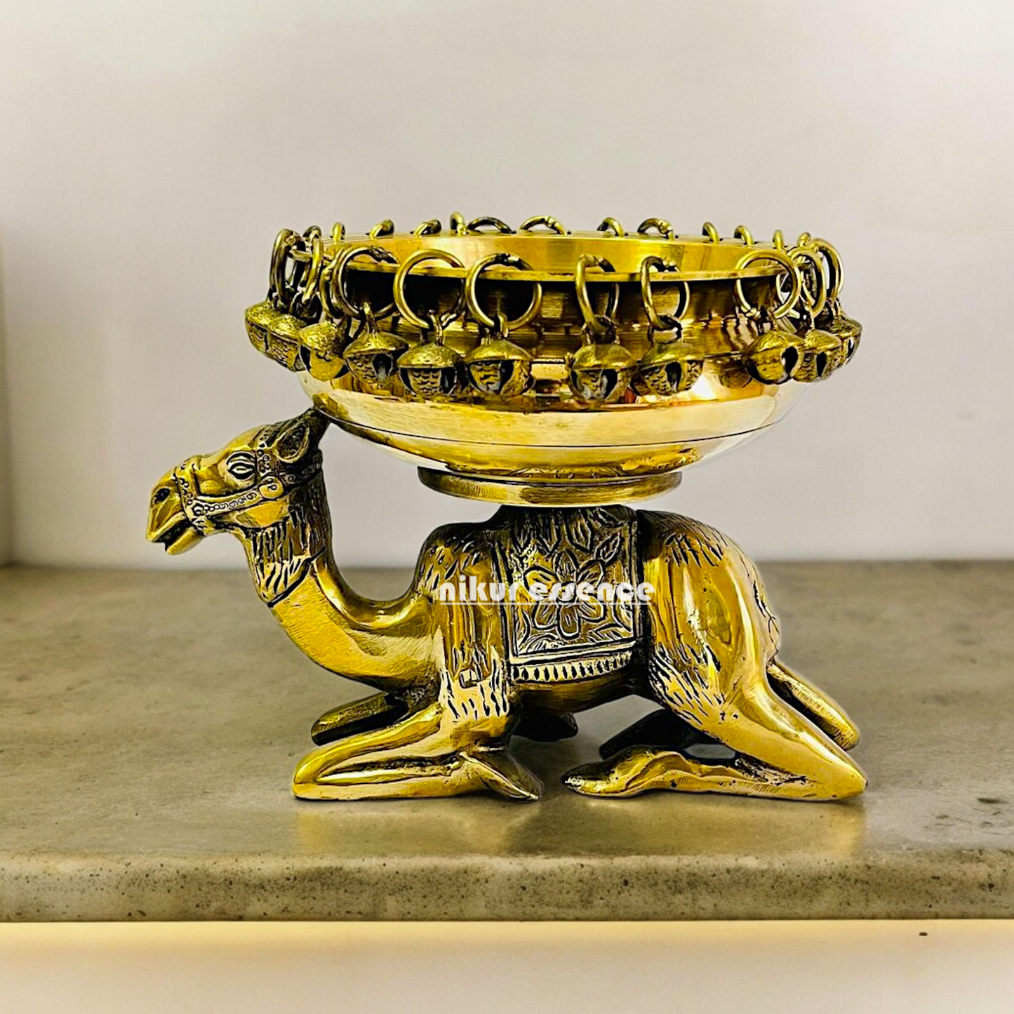 Buy online brass 20 cm Camel Design Traditional Indian Urli – Handcrafted Brass Decorative Bowl with Unique Camel Motif by Nikur Essence Nikuressence