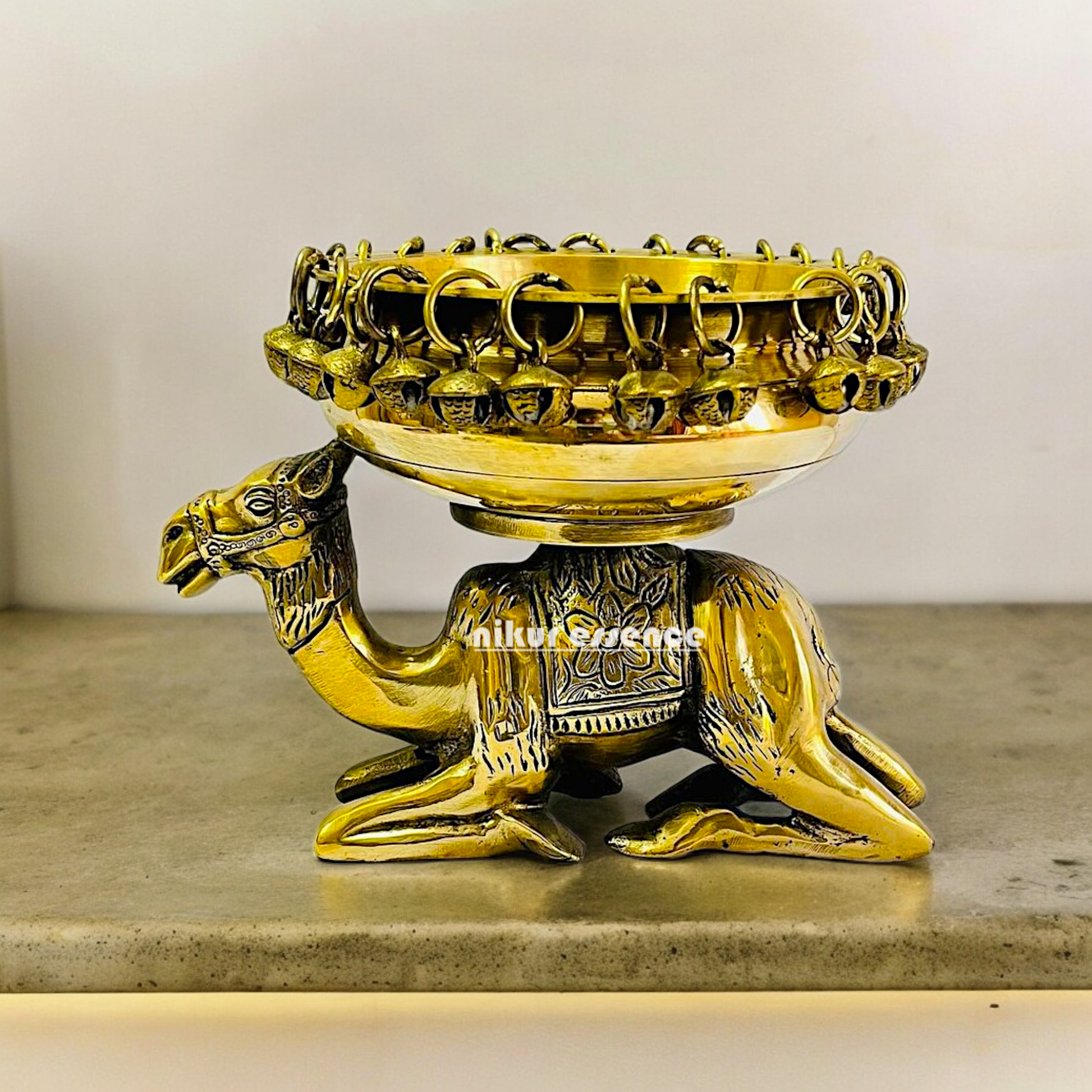 Buy online brass 20 cm Camel Design Traditional Indian Urli – Handcrafted Brass Decorative Bowl with Unique Camel Motif by Nikur Essence Nikuressence