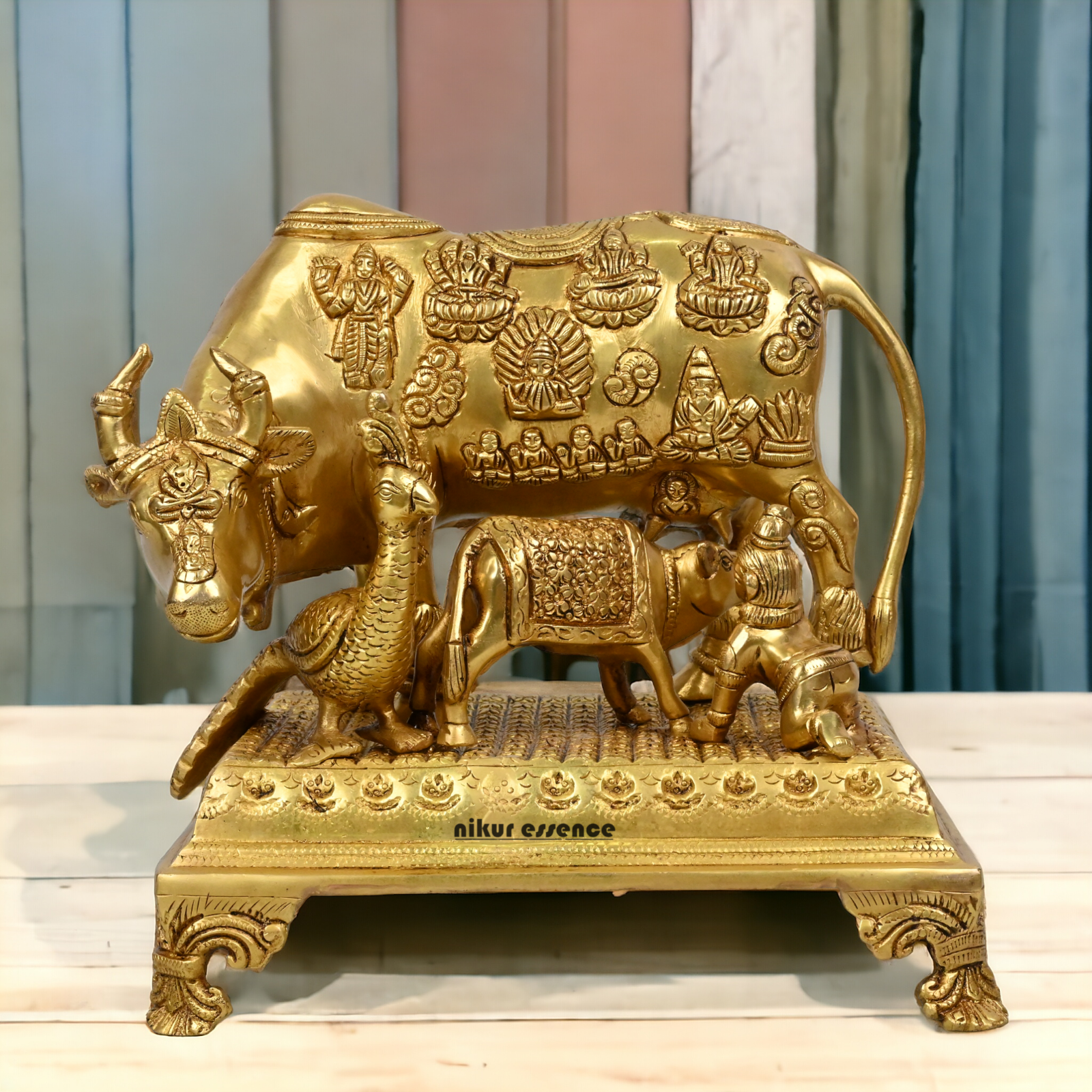 Buy Pure Brass Cow and a Calf with Baby Krishna By Nikur Essence - 10 Inch Height Nikuressence