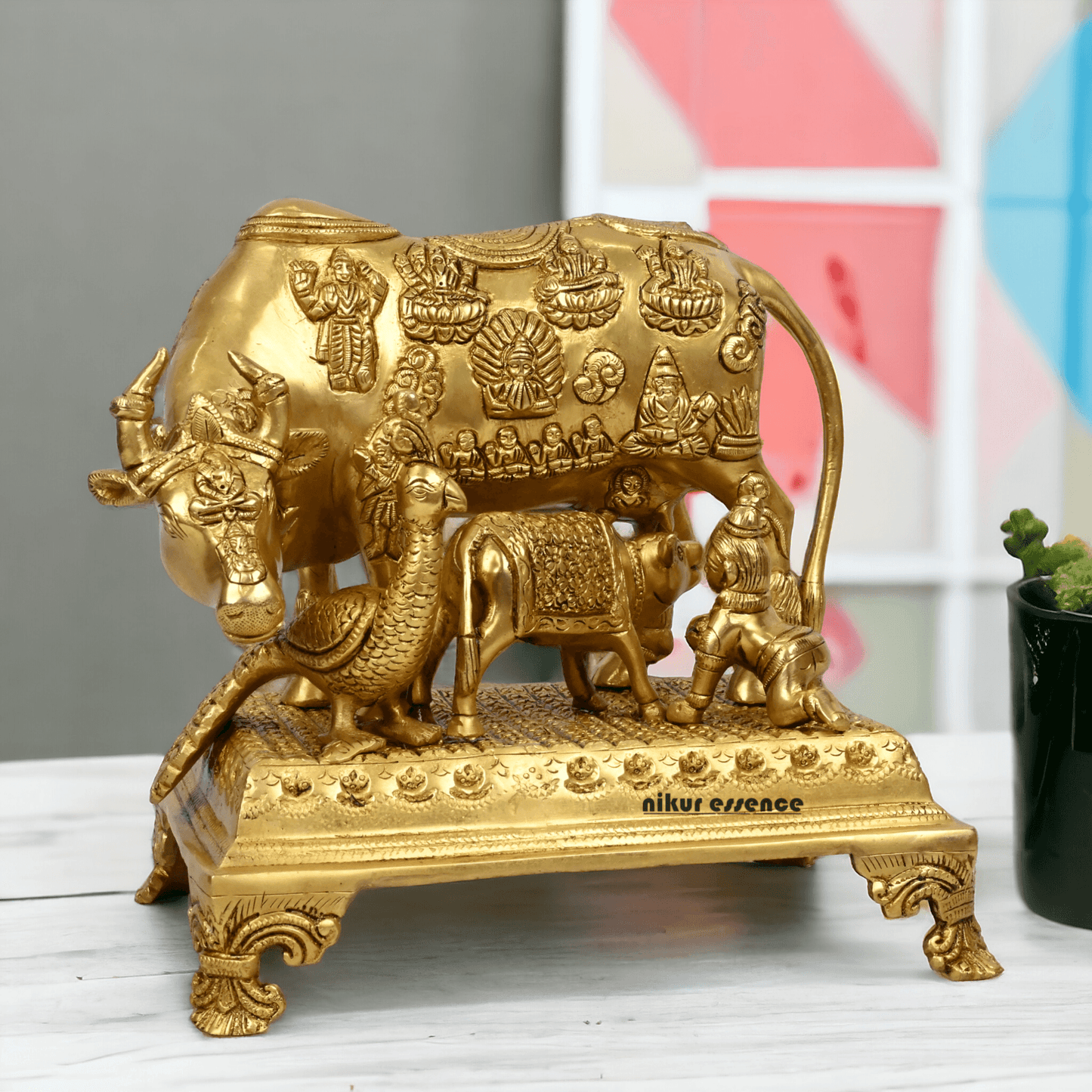 Buy Pure Brass Cow and a Calf with Baby Krishna By Nikur Essence - 10 Inch Height Nikuressence
