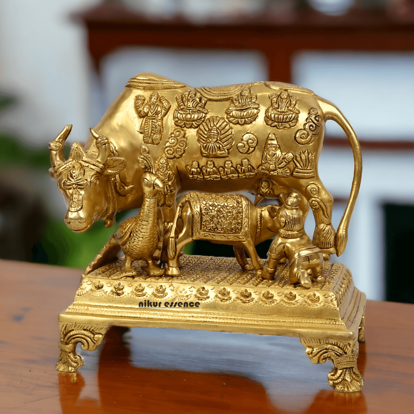 Buy Pure Brass Cow and a Calf with Baby Krishna By Nikur Essence - 10 Inch Height Nikuressence