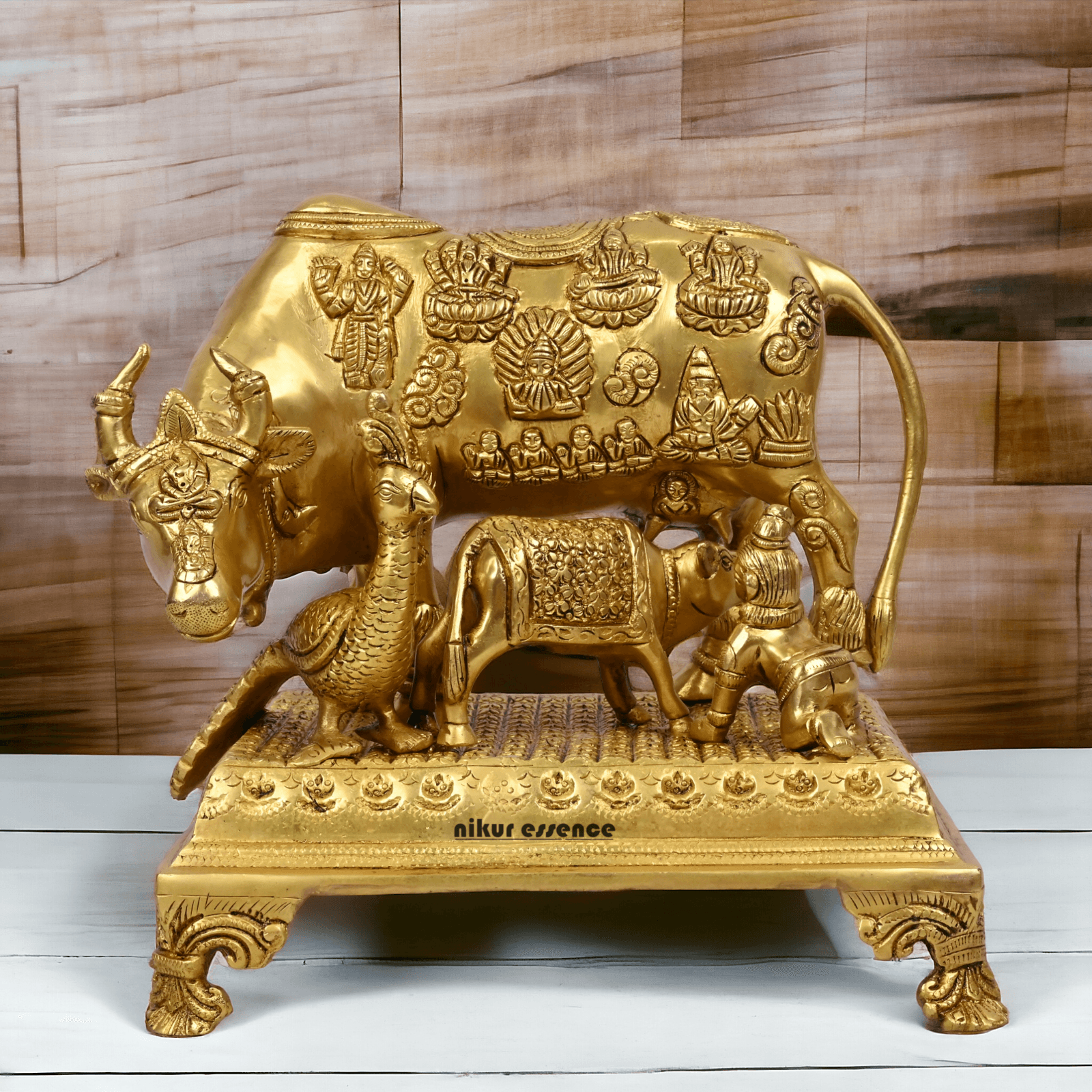 Buy Pure Brass Cow and a Calf with Baby Krishna By Nikur Essence - 10 Inch Height Nikuressence