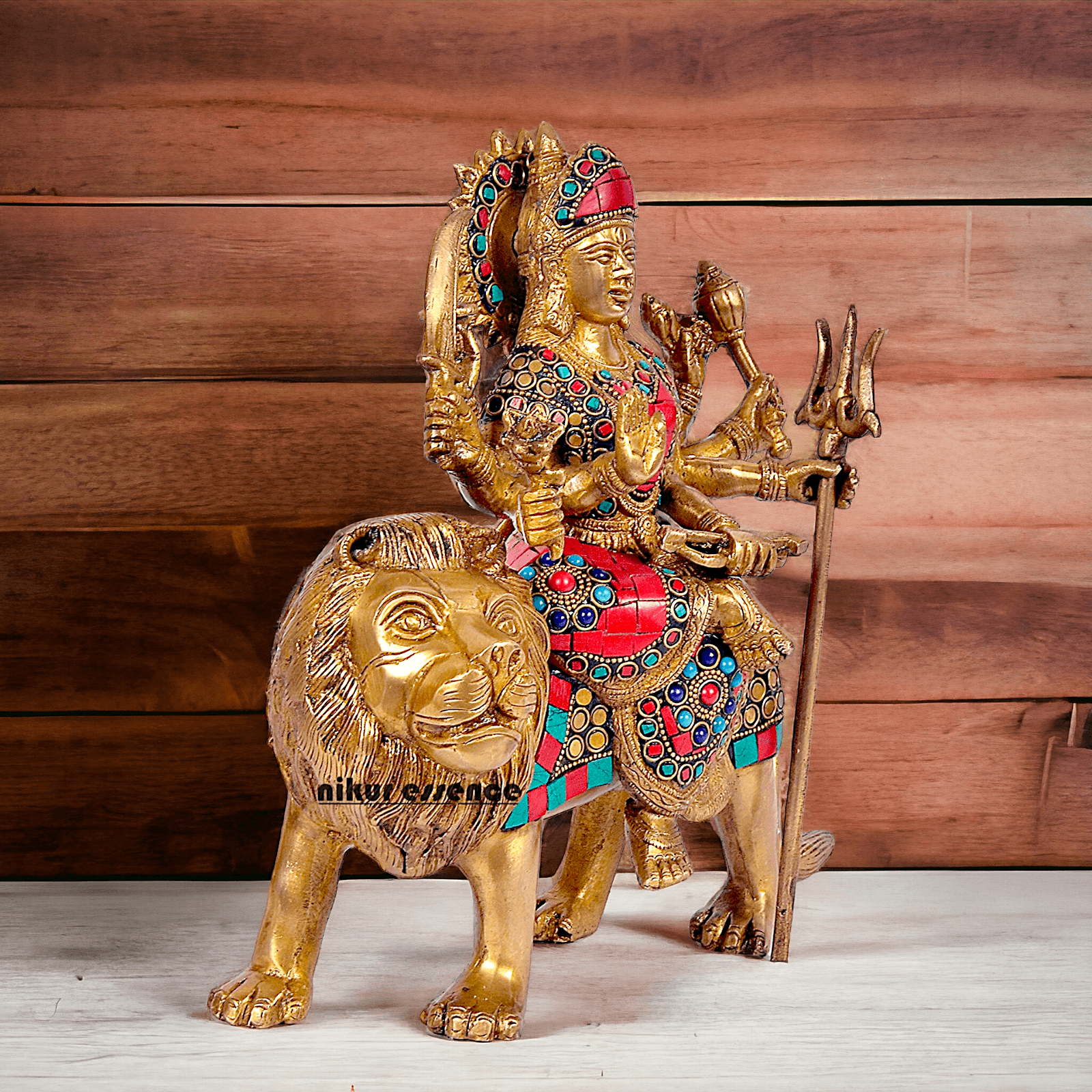 Buy Brass Sculpture of Mother Goddess Durga Seated on a Majestic Lion – 25.4 cm, An Intricate Work of Art by Nikur Essence Nikuressence