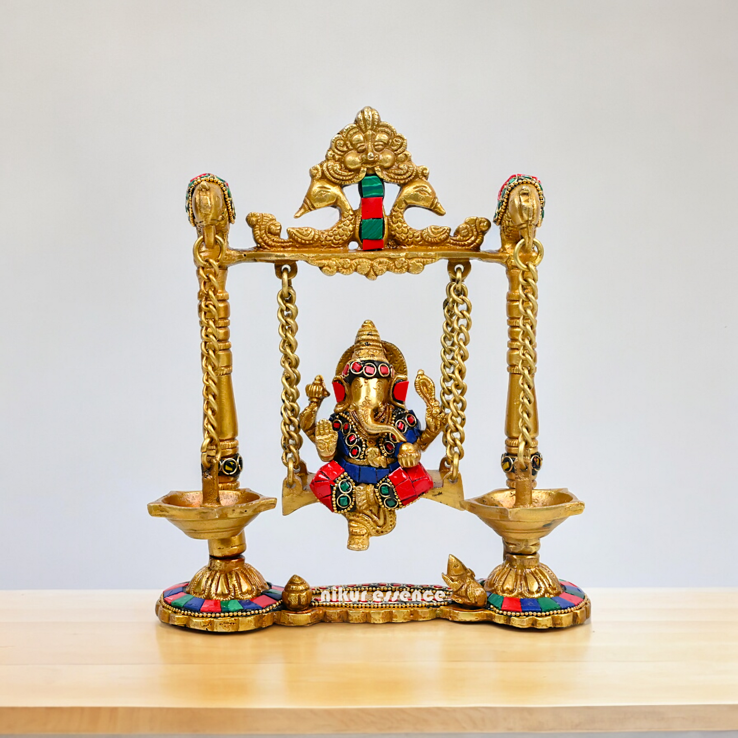 Buy Brass Ganesh Bhagwan Jhula with Two Diyas – Handcrafted Ganesha Idol 22.9 cm Nikuressence