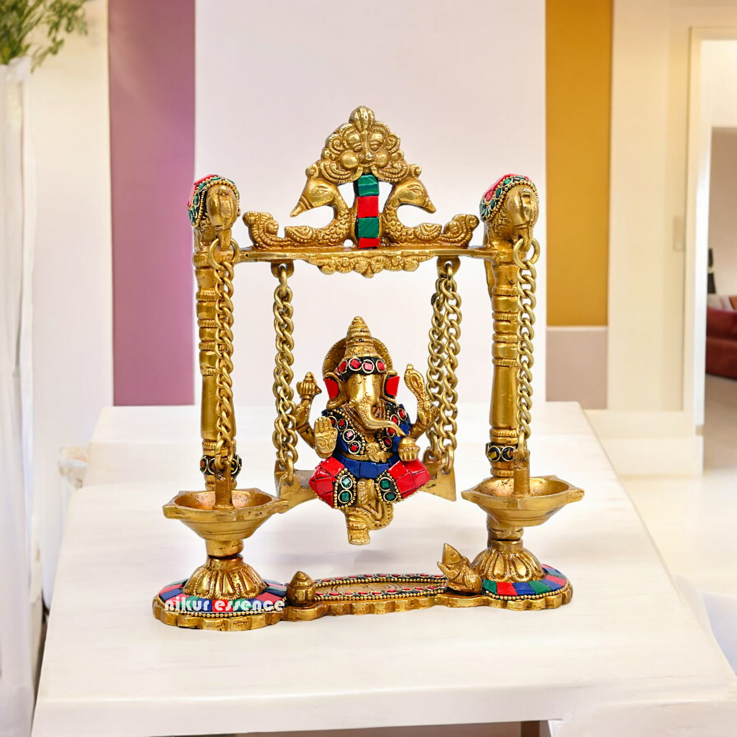 Buy Brass Ganesh Bhagwan Jhula with Two Diyas – Handcrafted Ganesha Idol 22.9 cm Nikuressence