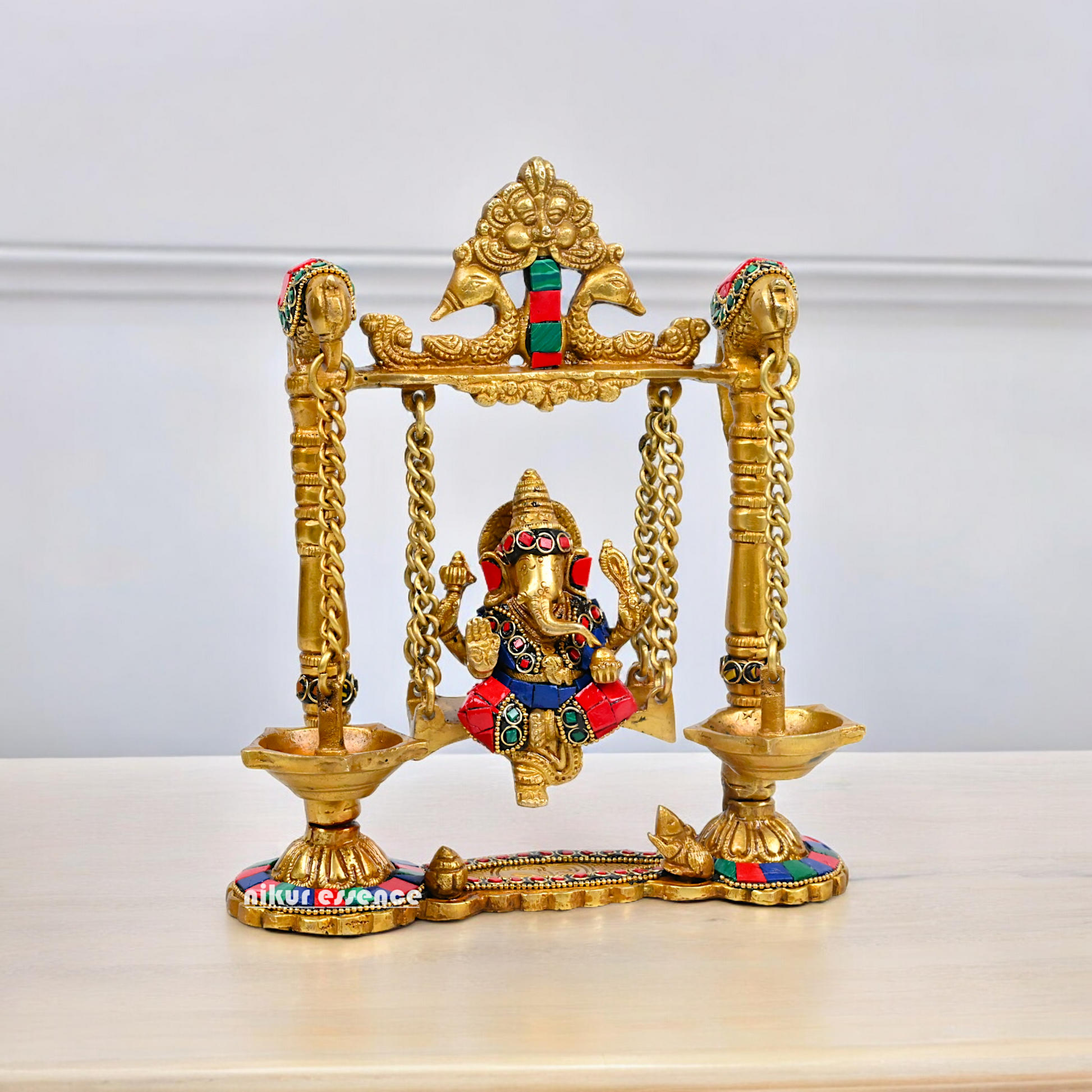 Buy Brass Ganesh Bhagwan Jhula with Two Diyas – Handcrafted Ganesha Idol 22.9 cm Nikuressence