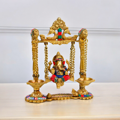 Buy Brass Ganesh Bhagwan Jhula with Two Diyas – Handcrafted Ganesha Idol 22.9 cm Nikuressence