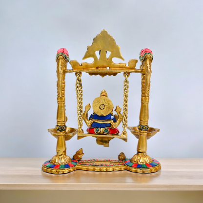 Buy Brass Ganesh Bhagwan Jhula with Two Diyas – Handcrafted Ganesha Idol 22.9 cm Nikuressence