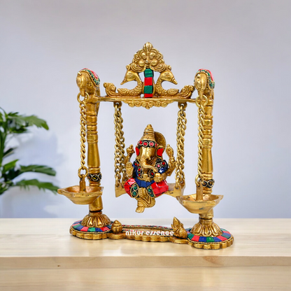 Buy Brass Ganesh Bhagwan Jhula with Two Diyas – Handcrafted Ganesha Idol 22.9 cm Nikuressence