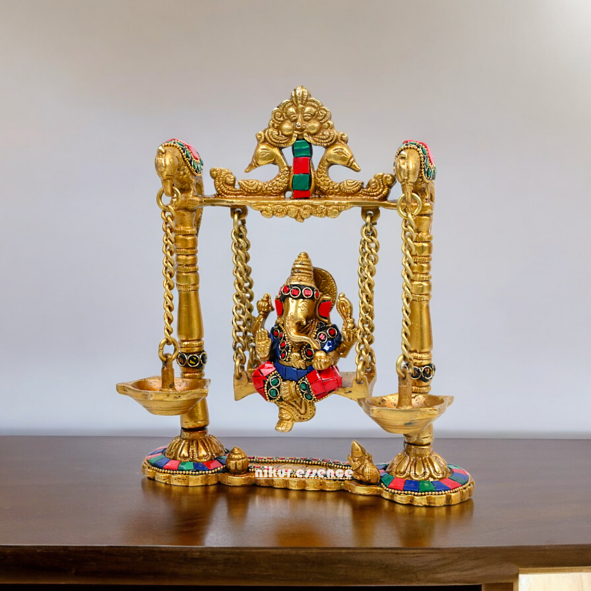 Buy Brass Ganesh Bhagwan Jhula with Two Diyas – Handcrafted Ganesha Idol 22.9 cm Nikuressence