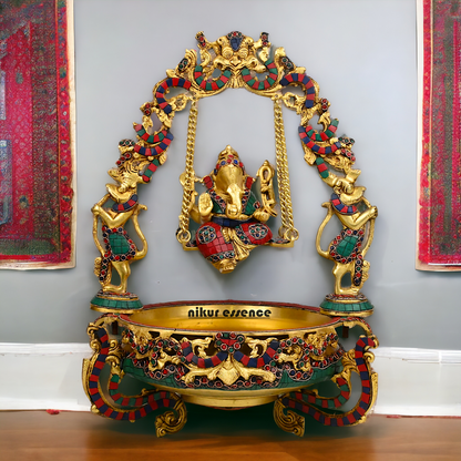 Brass Ganesh Jhula Urli with stone work -nikuressence Nikuressence