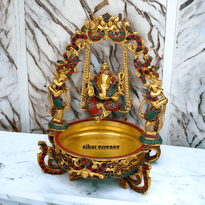Brass Ganesh Jhula Urli with stone work -nikuressence Nikuressence