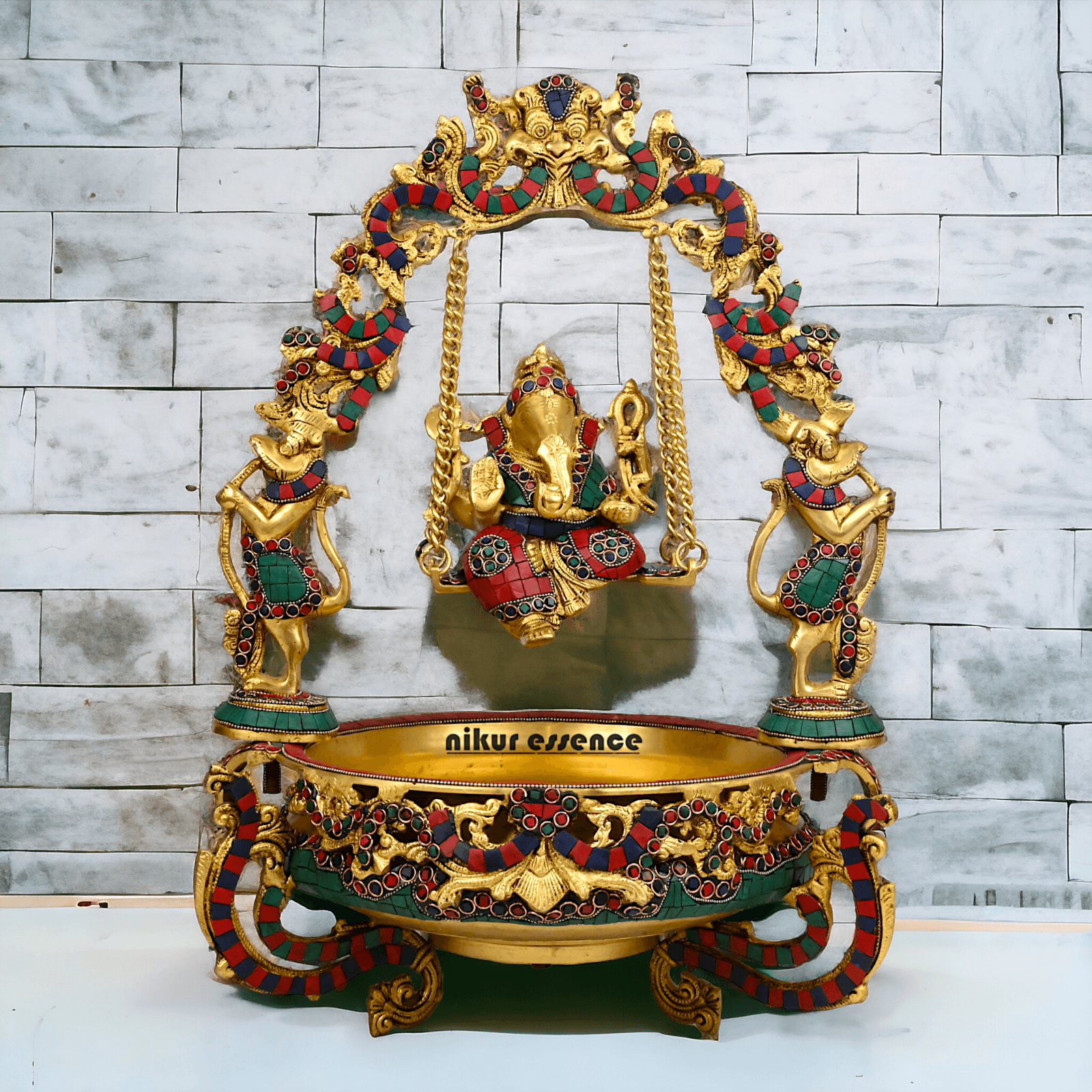 Brass Ganesh Jhula Urli with stone work -nikuressence Nikuressence