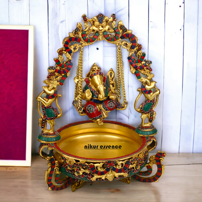 Brass Ganesh Jhula Urli with stone work -nikuressence Nikuressence