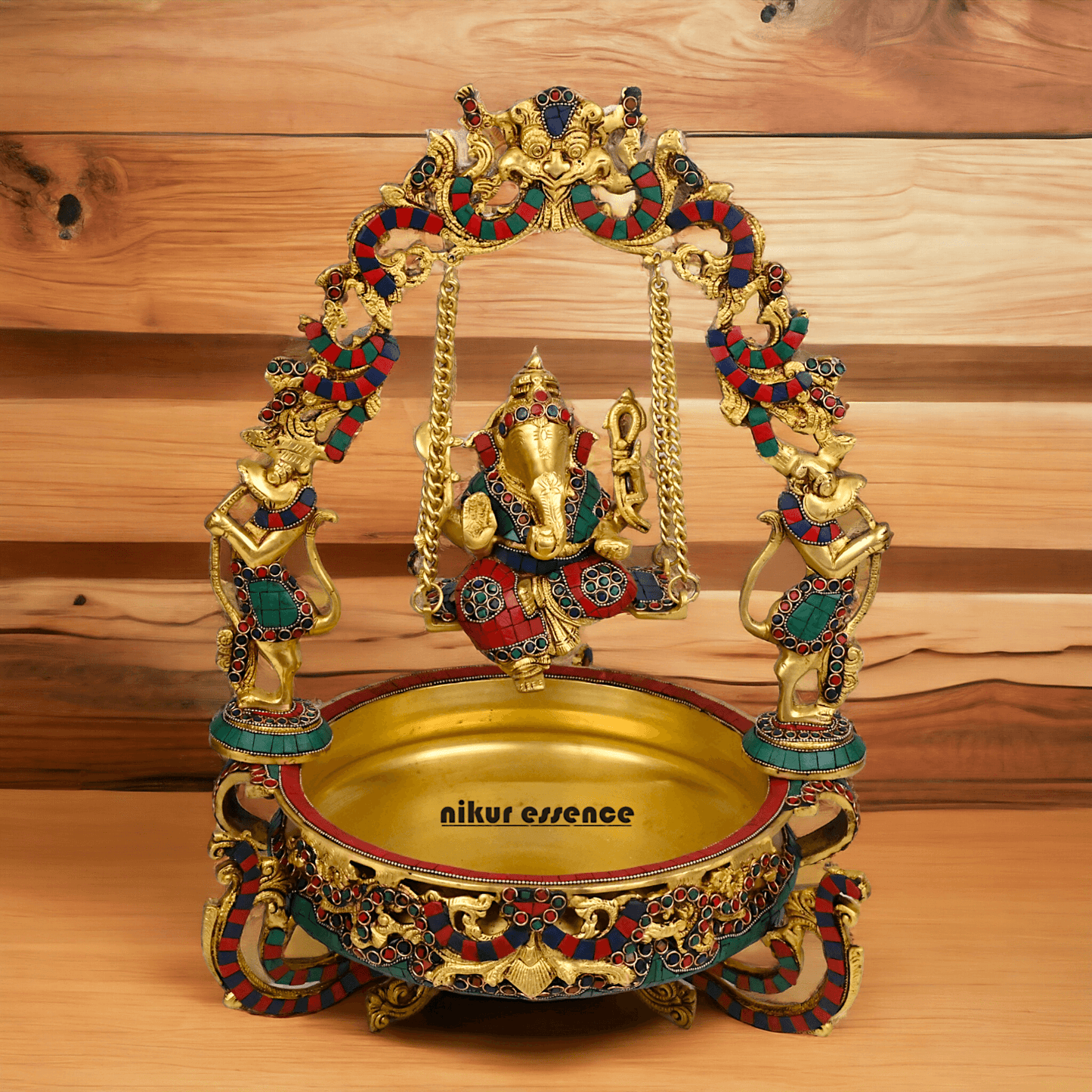 Brass Ganesh Jhula Urli with stone work -nikuressence Nikuressence