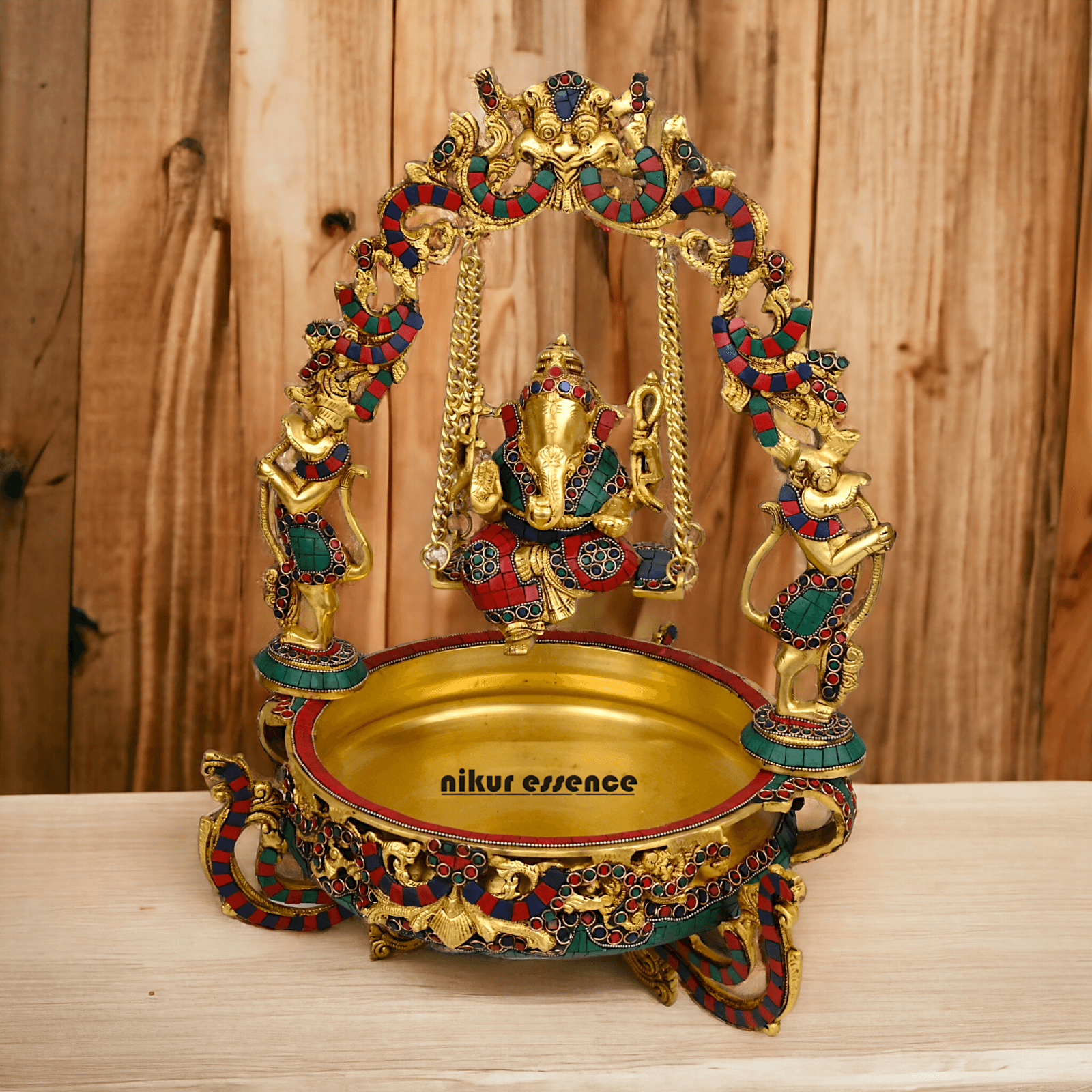 Brass Ganesh Jhula Urli with stone work -nikuressence Nikuressence