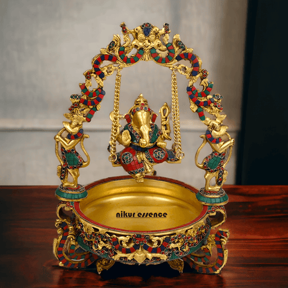 Brass Ganesh Jhula Urli with stone work -nikuressence Nikuressence