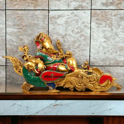 Buy pure Brass Ganesha Idol Relaxing on Peacock Recliner - nikur essence Nikuressence