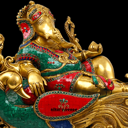 Buy pure Brass Ganesha Idol Relaxing on Peacock Recliner - nikur essence Nikuressence