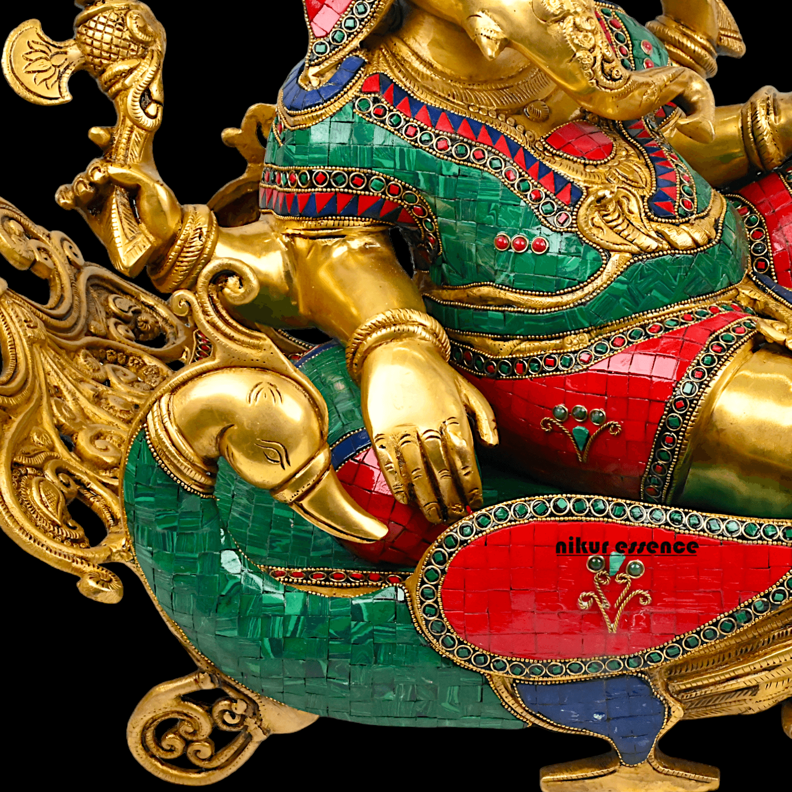 Buy pure Brass Ganesha Idol Relaxing on Peacock Recliner - nikur essence Nikuressence