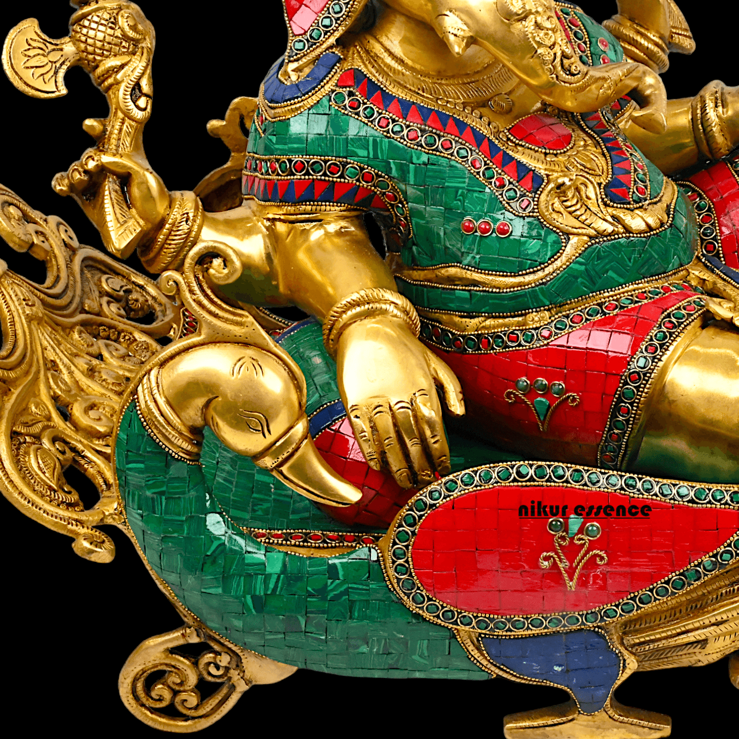 Buy pure Brass Ganesha Idol Relaxing on Peacock Recliner - nikur essence Nikuressence