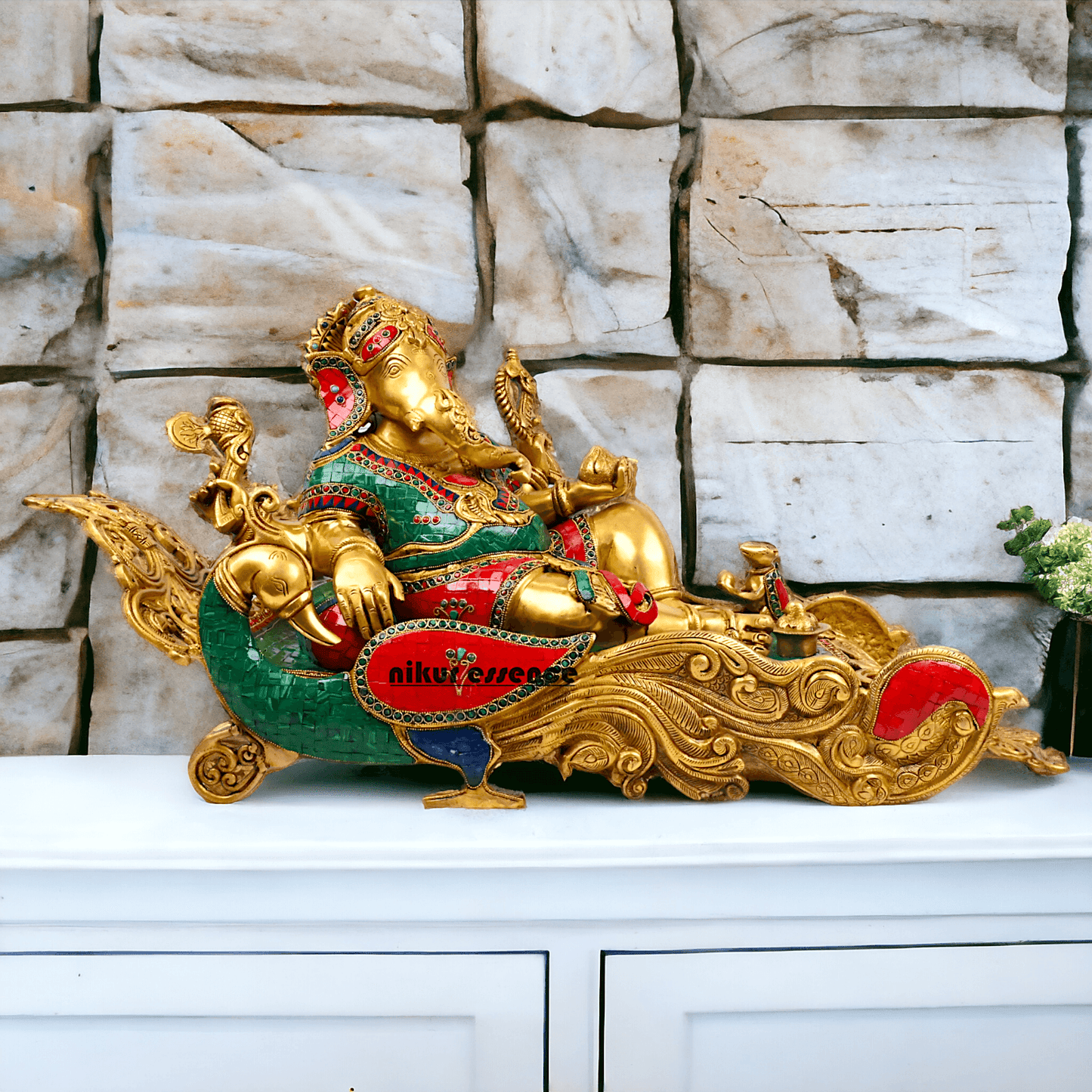 Buy pure Brass Ganesha Idol Relaxing on Peacock Recliner - nikur essence Nikuressence