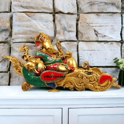 Buy pure Brass Ganesha Idol Relaxing on Peacock Recliner - nikur essence Nikuressence