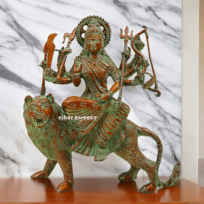 Buy brass 28 cm Mother Goddess Durga Statue - Elegant and Detailed Divine Sculpture, Perfect for Spiritual Altars and Home Decoration | Nikur Essence Nikuressence