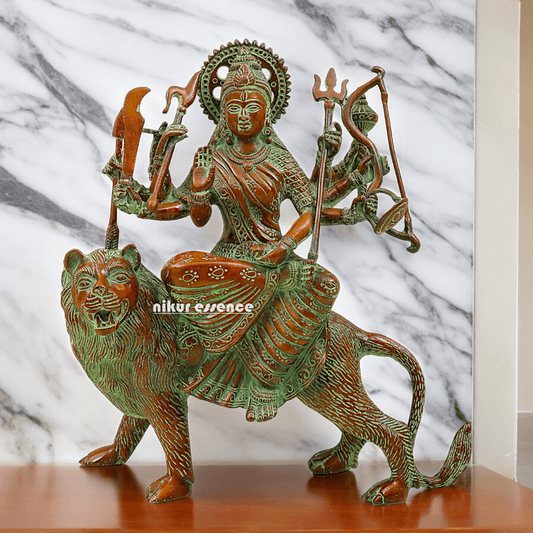Buy brass 28 cm Mother Goddess Durga Statue - Elegant and Detailed Divine Sculpture, Perfect for Spiritual Altars and Home Decoration | Nikur Essence Nikuressence