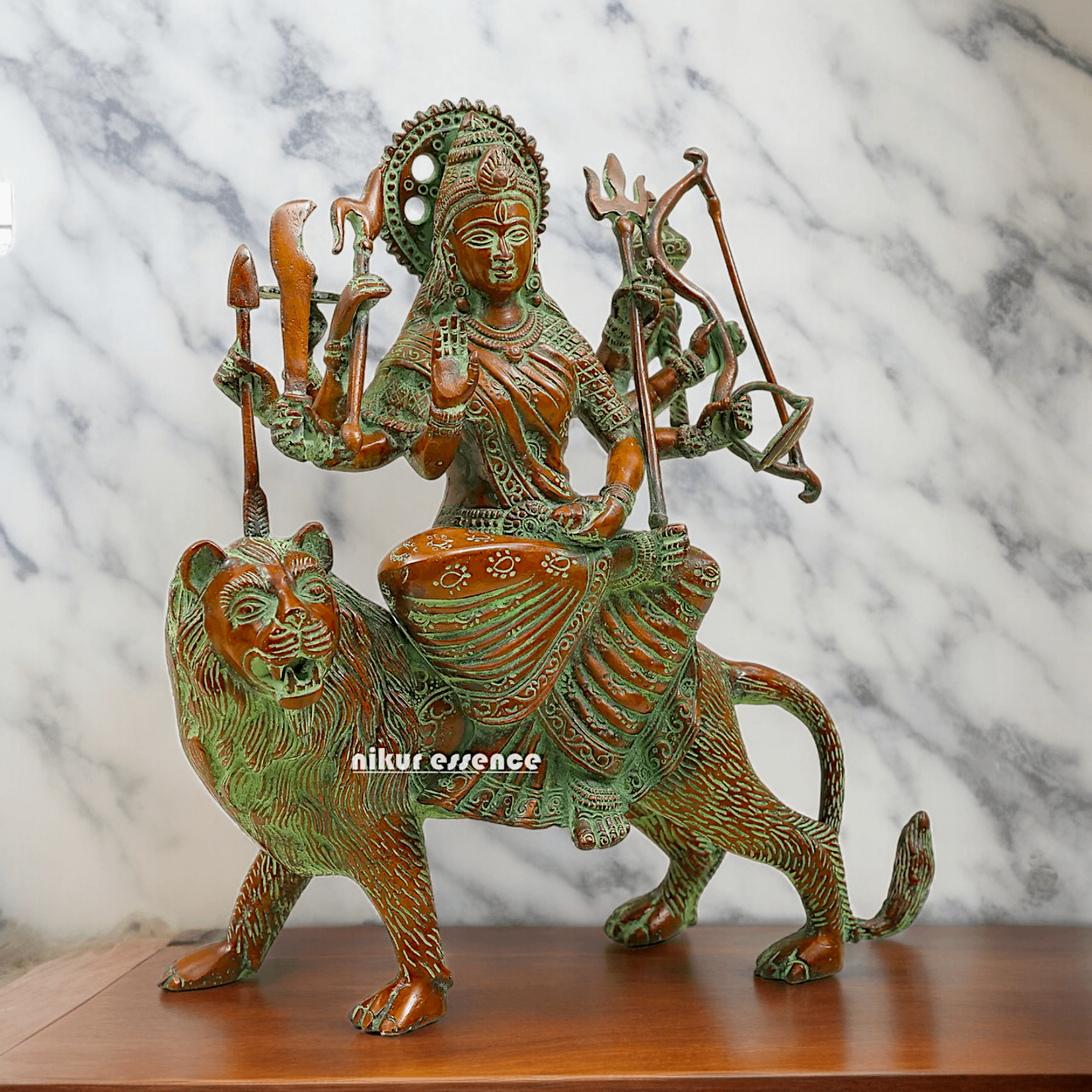 Buy brass 28 cm Mother Goddess Durga Statue - Elegant and Detailed Divine Sculpture, Perfect for Spiritual Altars and Home Decoration | Nikur Essence Nikuressence