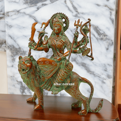 Buy brass 28 cm Mother Goddess Durga Statue - Elegant and Detailed Divine Sculpture, Perfect for Spiritual Altars and Home Decoration | Nikur Essence Nikuressence