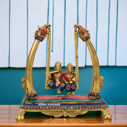 Buy Brass Krishna swing jhula Idol with stone work by Nikur Essence - 11 inches height Nikuressence