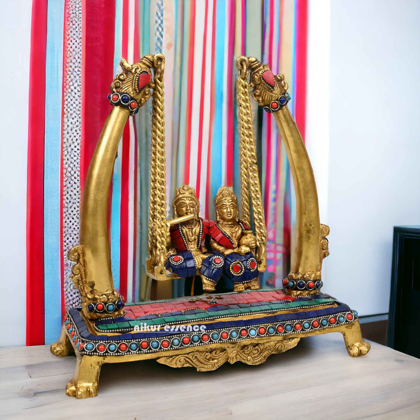 Buy Brass Krishna swing jhula Idol with stone work by Nikur Essence - 11 inches height Nikuressence