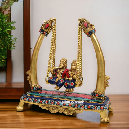 Buy Brass Krishna swing jhula Idol with stone work by Nikur Essence - 11 inches height Nikuressence