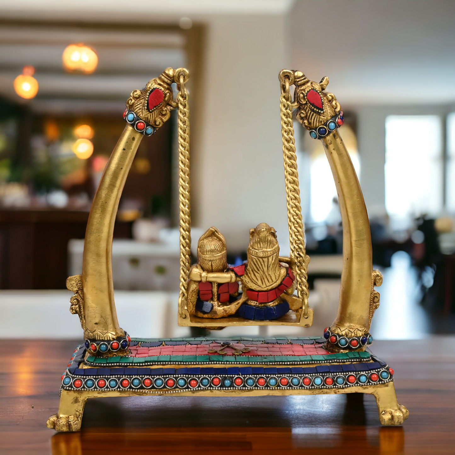 Buy Brass Krishna swing jhula Idol with stone work by Nikur Essence - 11 inches height Nikuressence