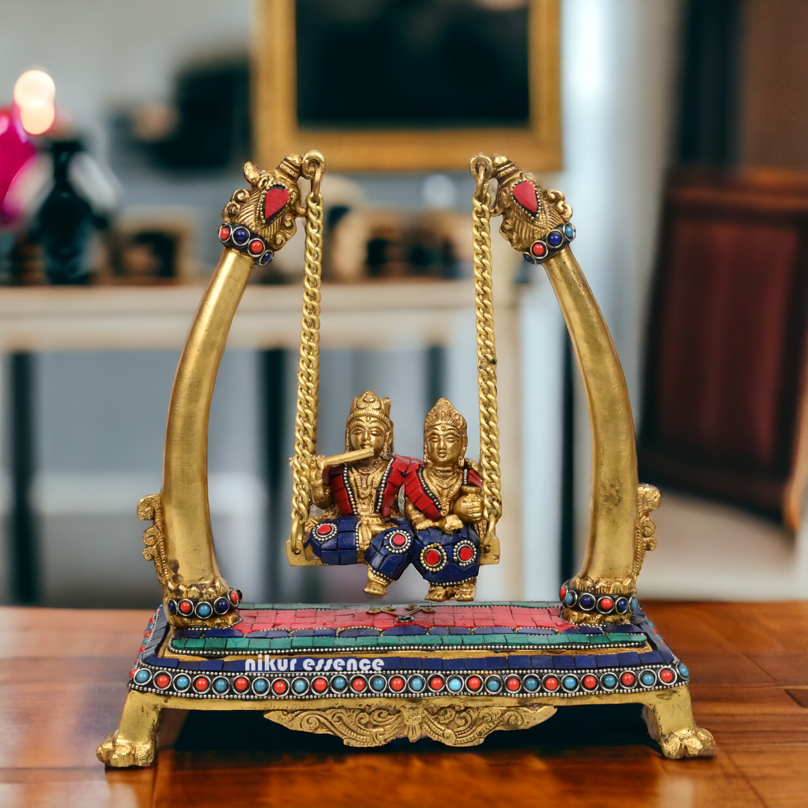 Buy Brass Krishna swing jhula Idol with stone work by Nikur Essence - 11 inches height Nikuressence
