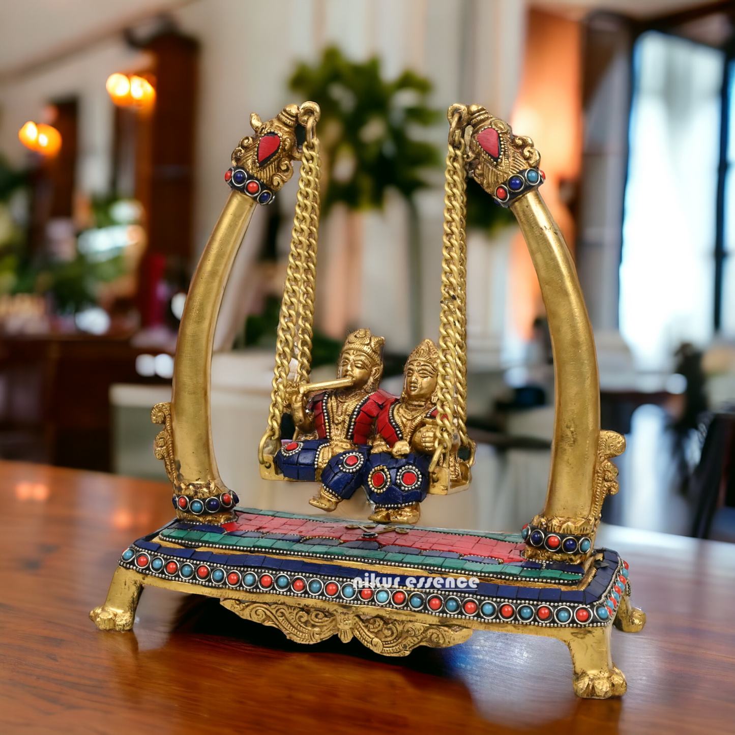 Buy Brass Krishna swing jhula Idol with stone work by Nikur Essence - 11 inches height Nikuressence