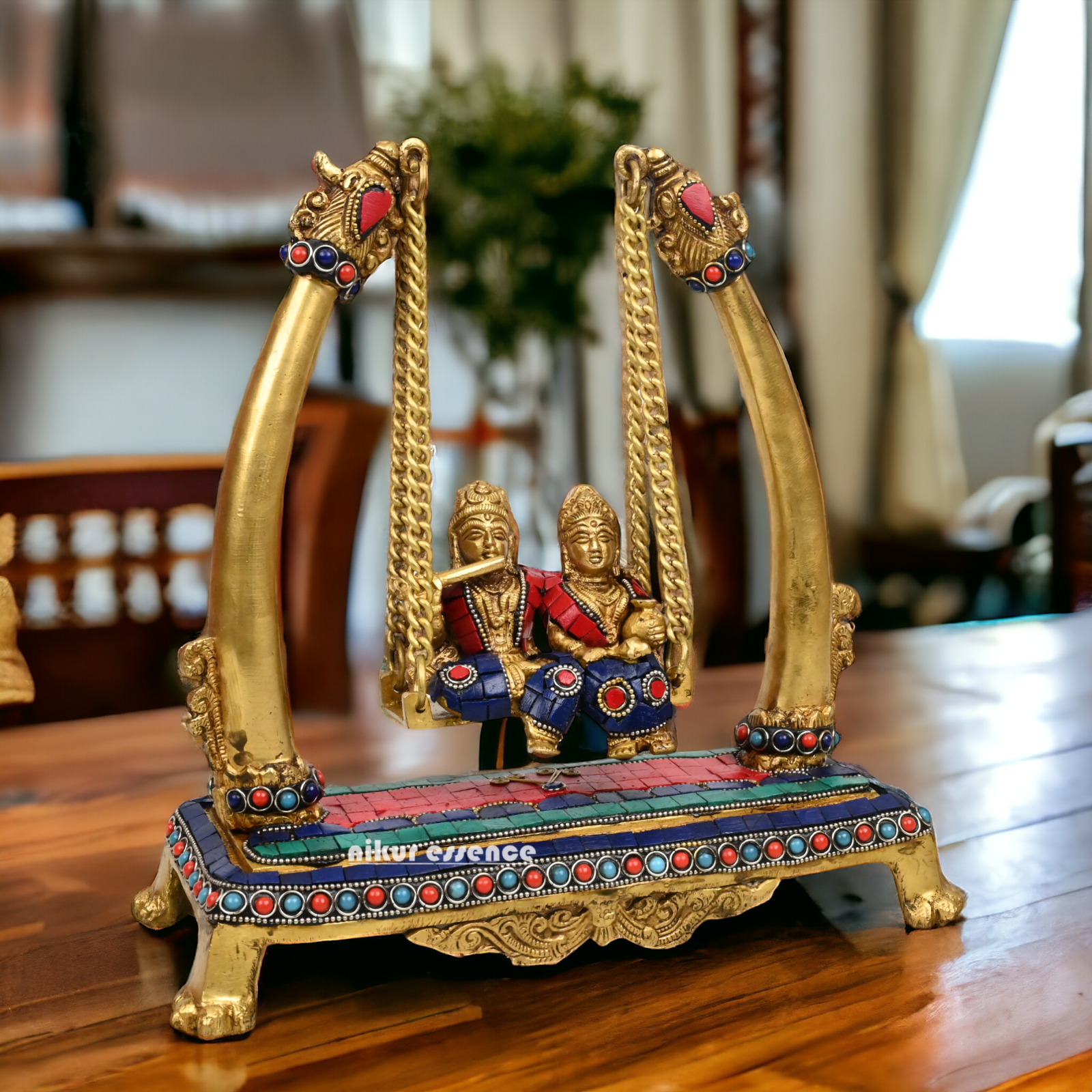 Buy Brass Krishna swing jhula Idol with stone work by Nikur Essence - 11 inches height Nikuressence