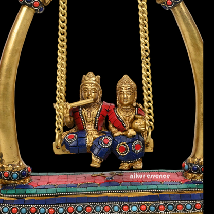 Buy Brass Krishna swing jhula Idol with stone work by Nikur Essence - 11 inches height Nikuressence