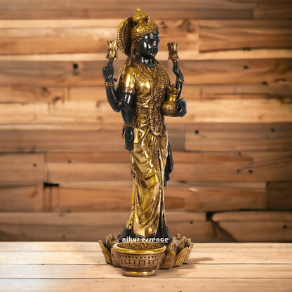 Buy Brass Lakshmi Statue online,Standing on Lotus in Black and Golden Goddess Dhana Traditional Hindu Religious Figurine with Intricate Detailing Nikuressence